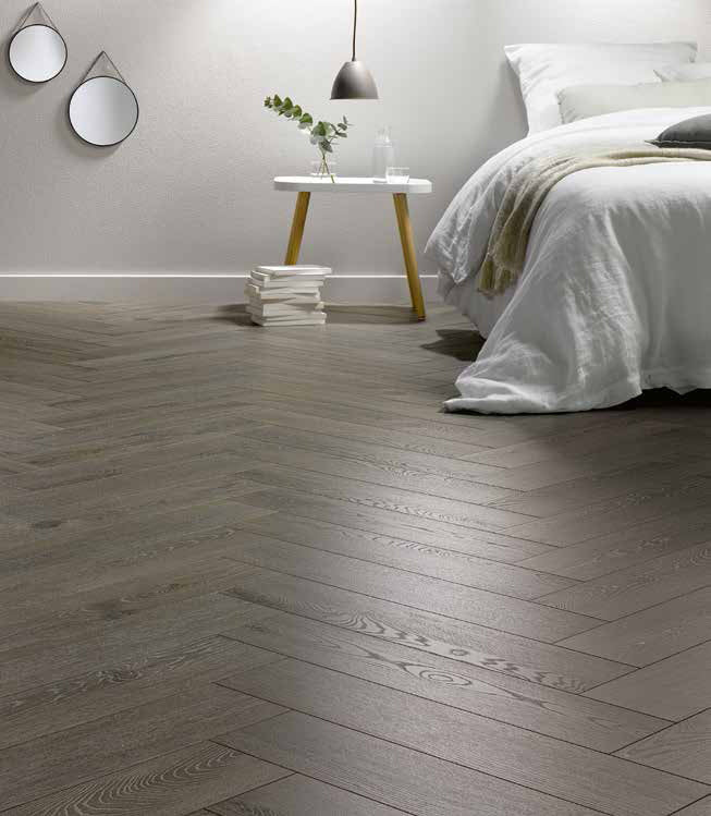 Side view of Apolo Grey Engineered Timber Herringbone 15.3mm in Apolo Grey colour neutral tone herringbone flooring sample