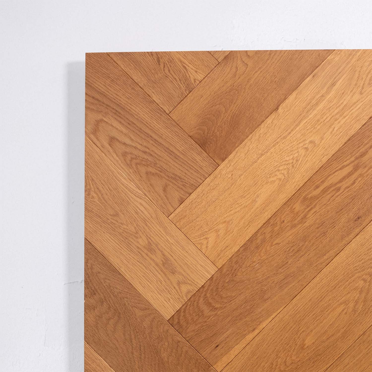 Side view of Beige Ash Engineered Timber Herringbone 15.3mm in Beige Ash colour neutral tone herringbone flooring sample