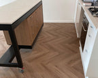 Angled view of Beige Ash Engineered Timber Herringbone 15.3mm in Beige Ash colour neutral tone herringbone flooring sample