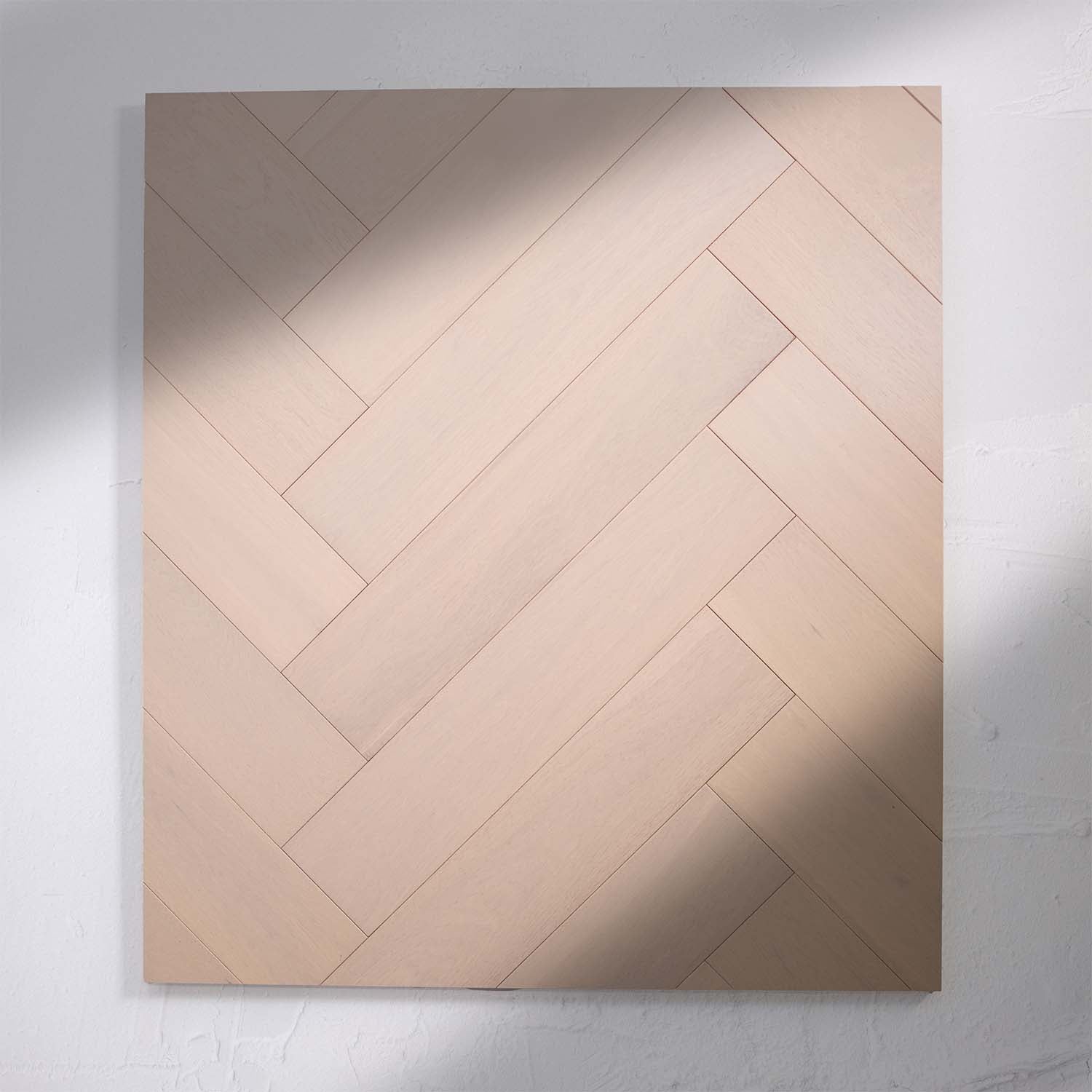 Perspective view of Casper White Engineered Timber Herringbone 15.3mm in Casper White colour light tone herringbone flooring sample