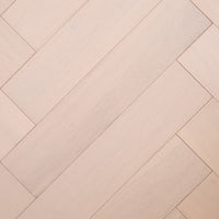 Top-down view of Casper White Engineered Timber Herringbone 15.3mm in Casper White colour light tone herringbone flooring sample