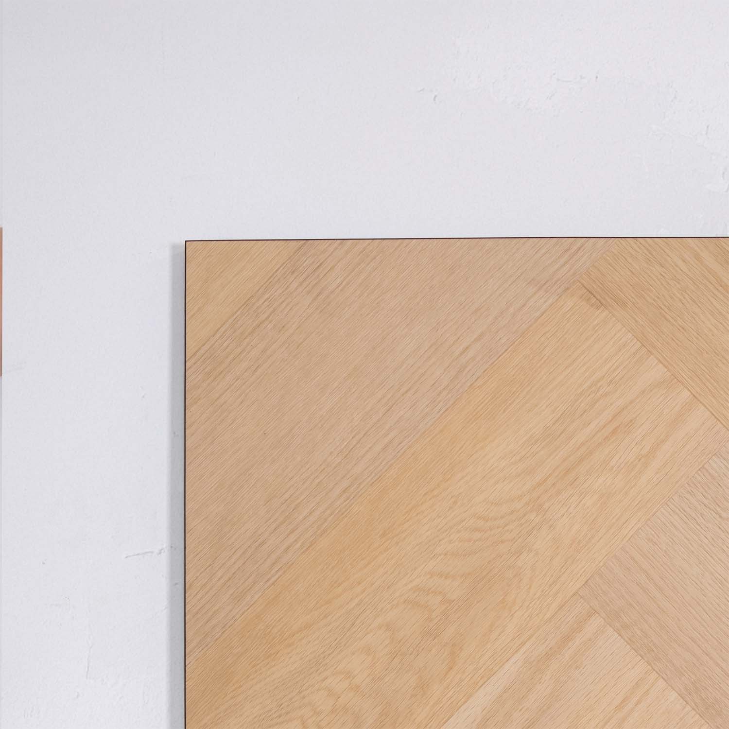 Profile view of French Oak SPC Hybrid Floorboards Herringbone 7.5+2mm in French Oak colour warm tone herringbone flooring sample