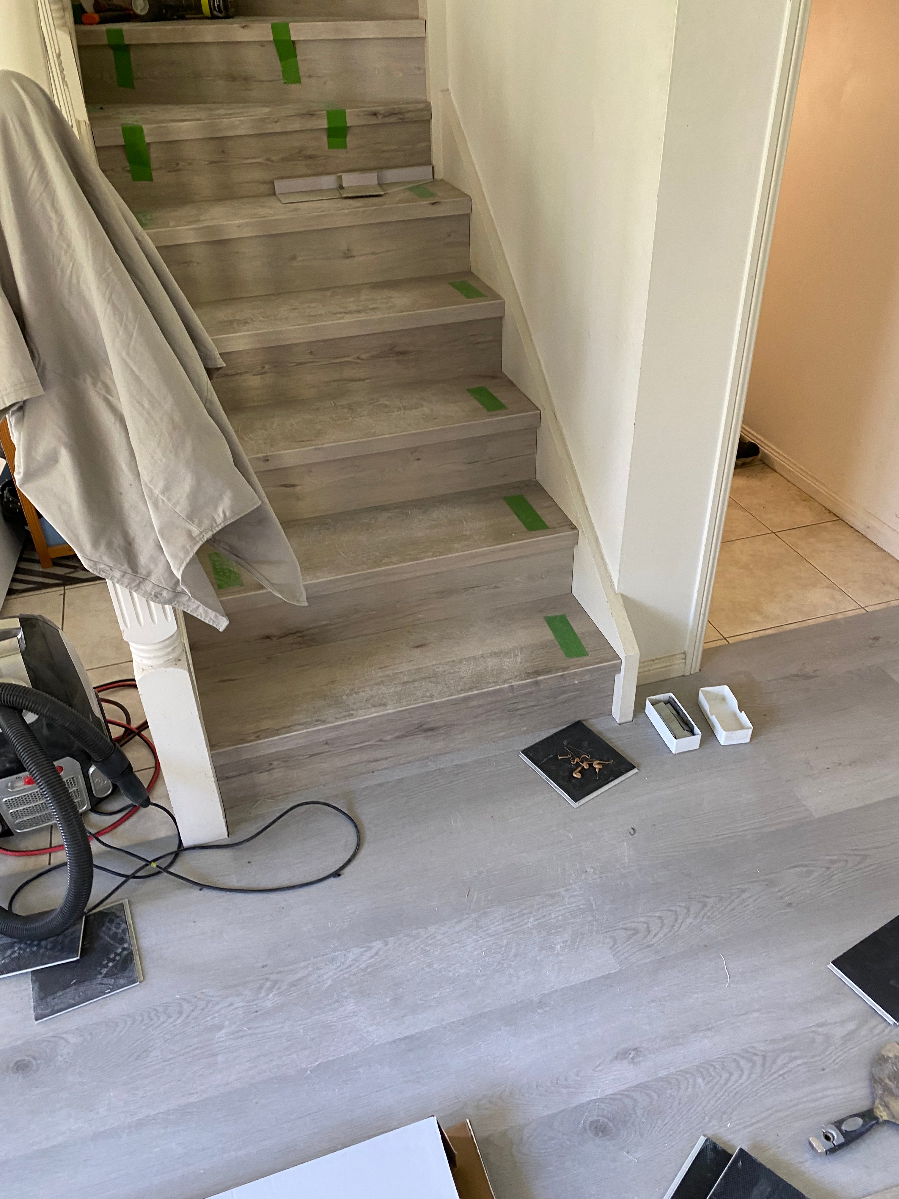 Detail view of Light Grey SPC 6.5mm SPC hybrid flooring sample