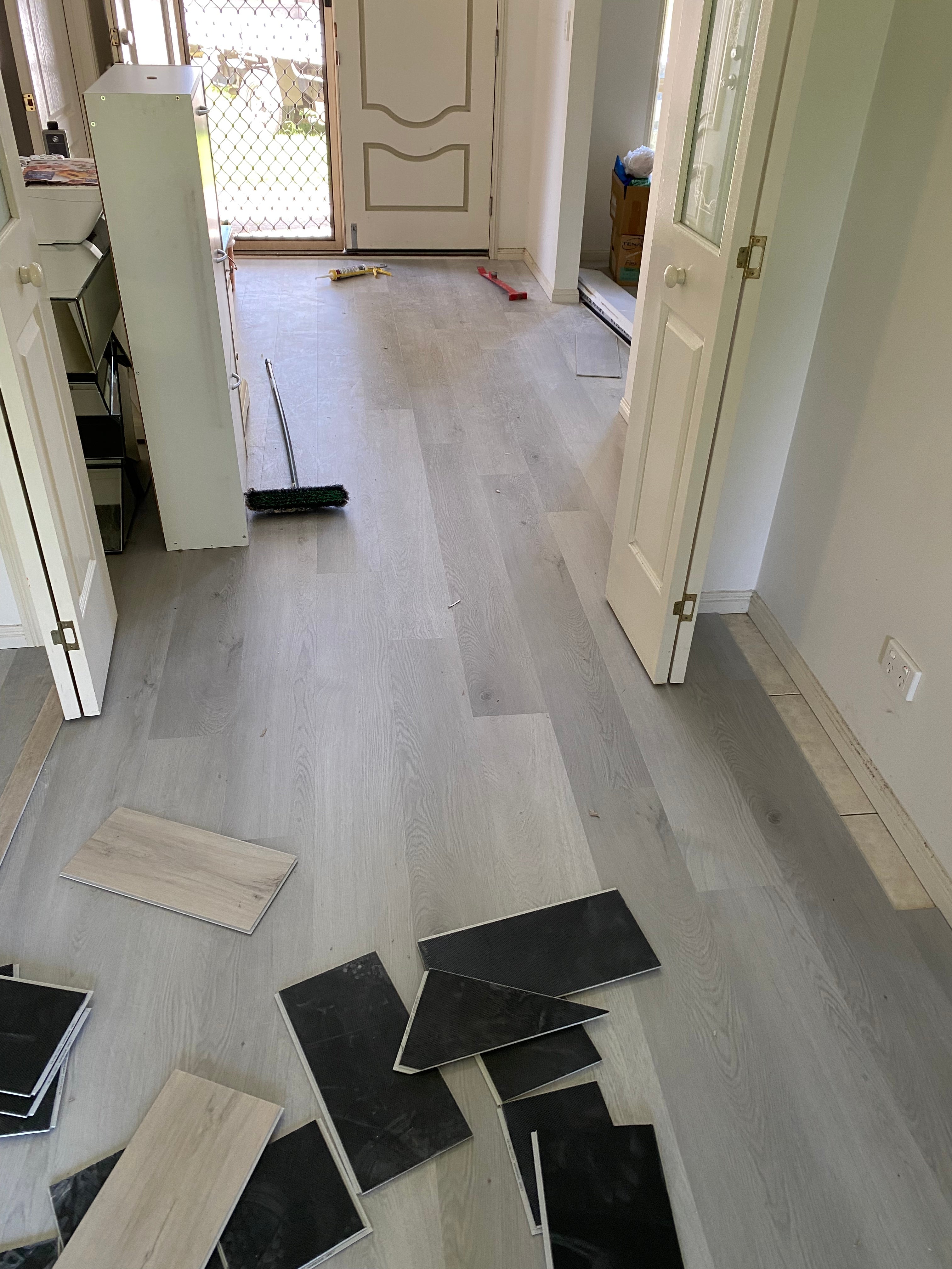 Detail view of Light Grey SPC 6.5mm SPC hybrid flooring sample