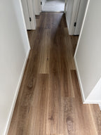 Installed room view of QLD Spotted Gum SPC 6.5mm SPC hybrid flooring sample
