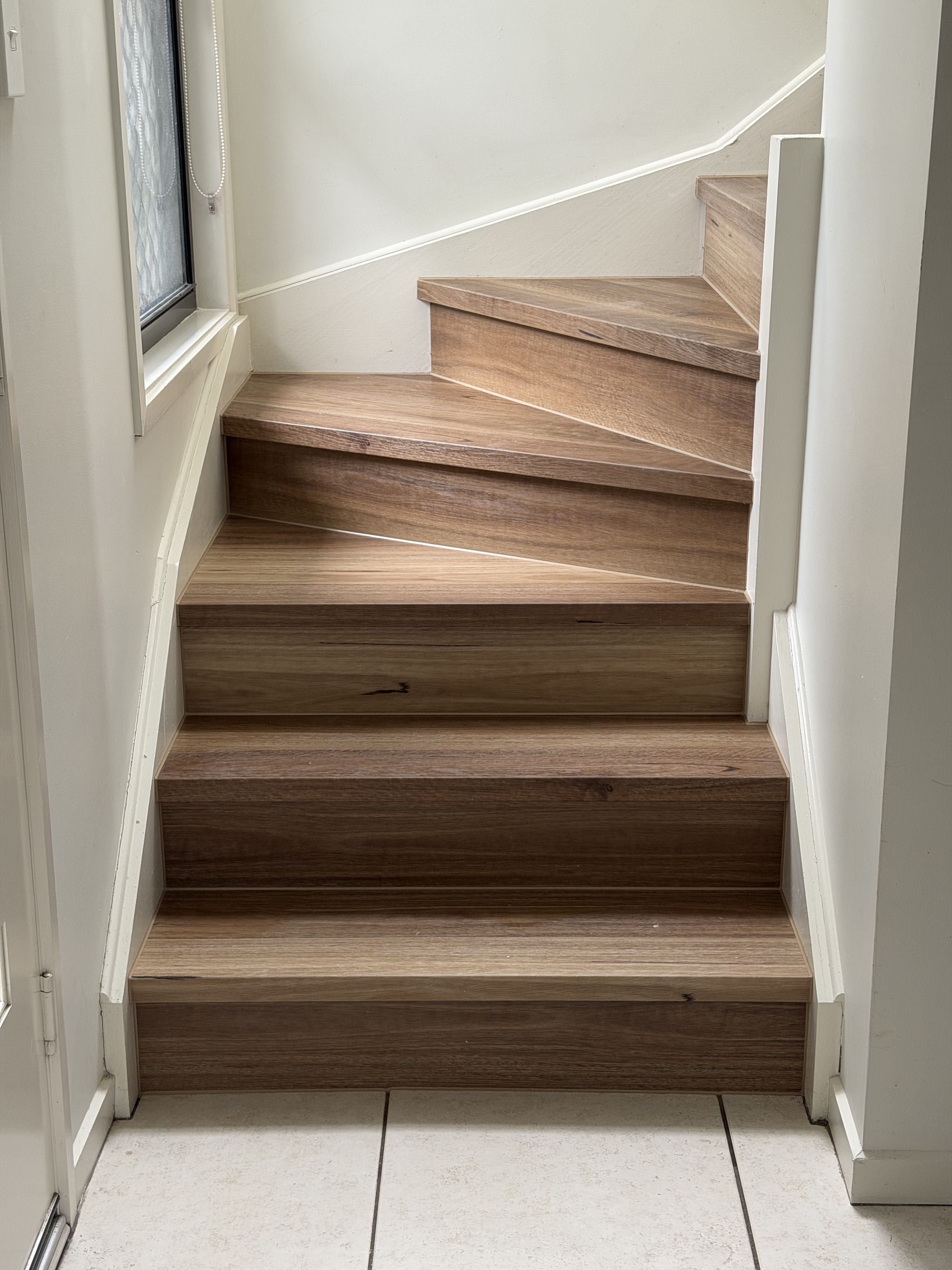 Installed room view of QLD Spotted Gum SPC 6.5mm SPC hybrid flooring sample