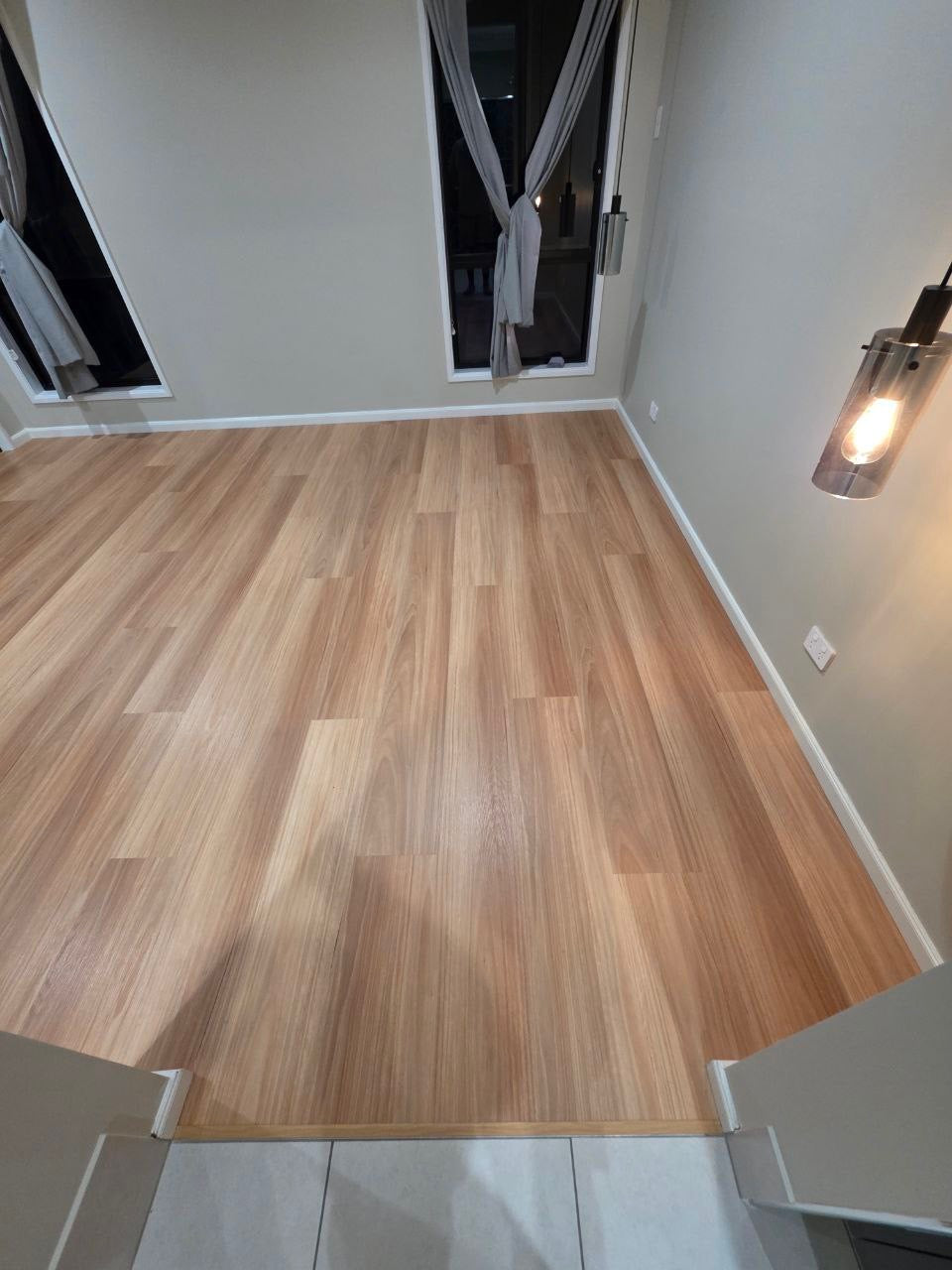 Installed room view of Natural Blackbutt SPC 9.5mm SPC hybrid flooring sample