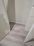 Installed room view of Snow Grey SPC 9.5mm SPC hybrid flooring sample