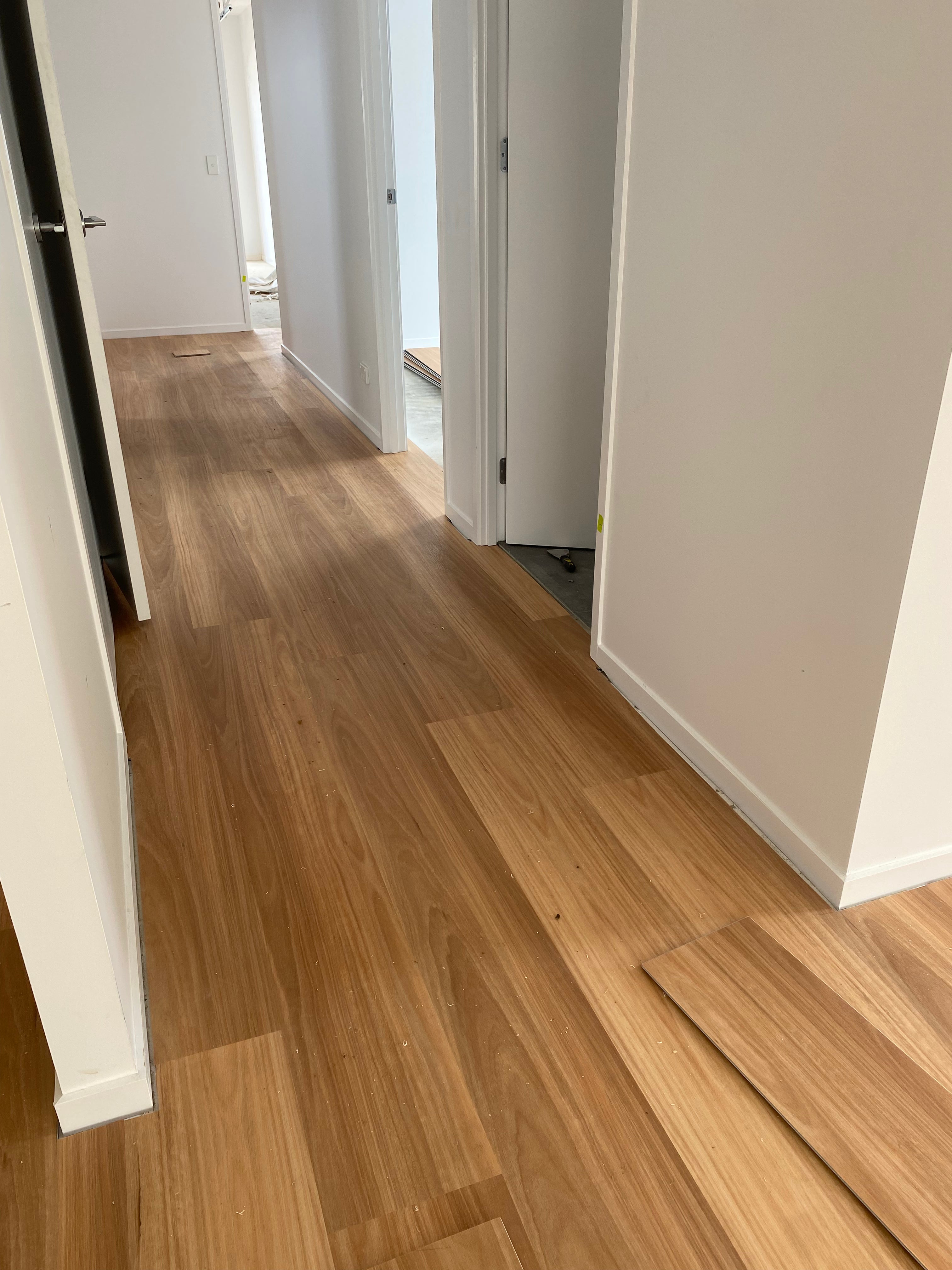Installed room view of Natural Blackbutt SPC 9.5mm SPC hybrid flooring sample