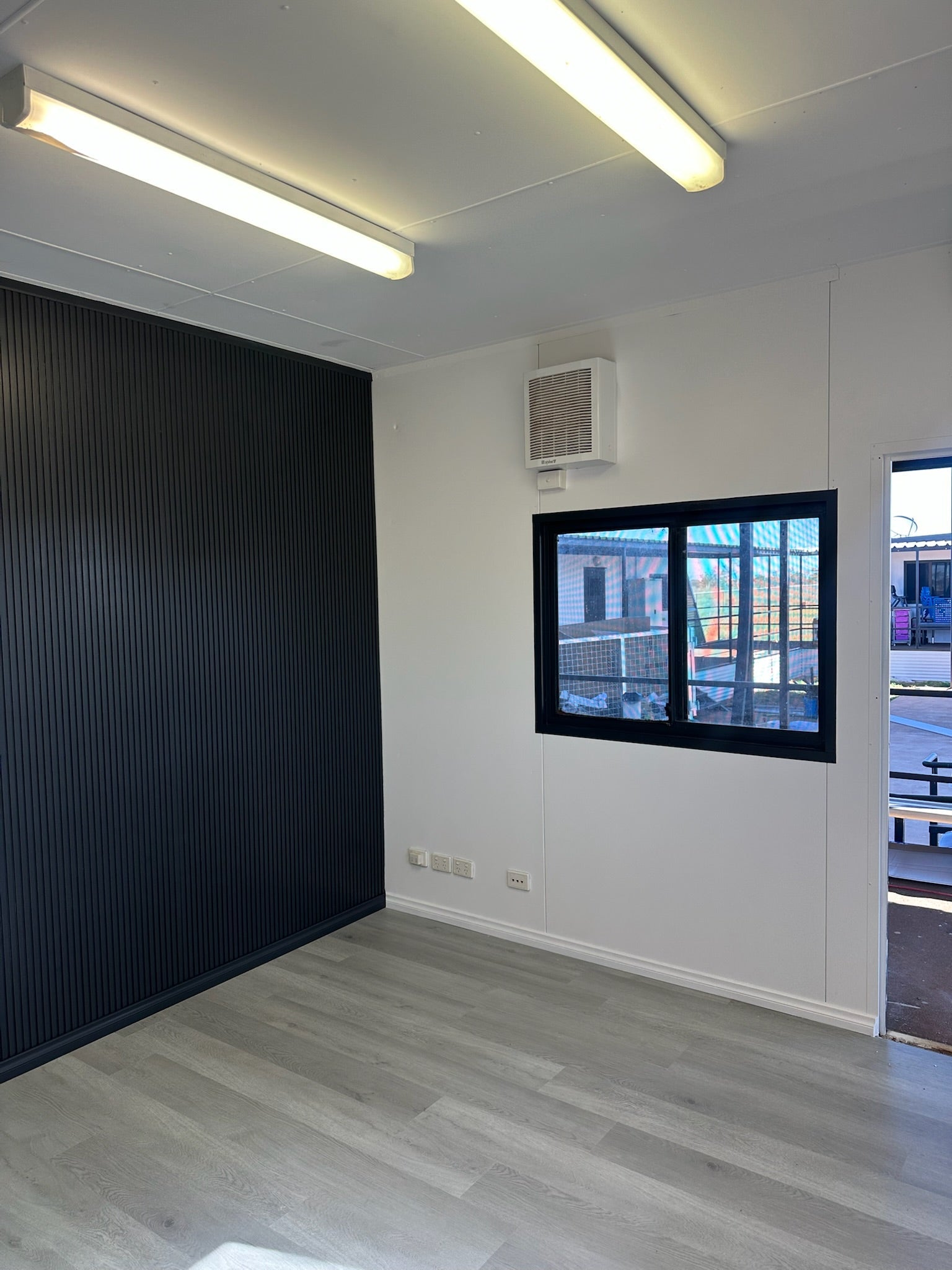 Detail view of Light Grey SPC 6.5mm SPC hybrid flooring sample