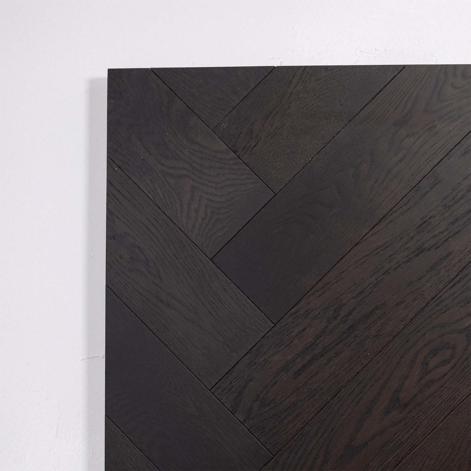 Detailed view of Midnight Grey Engineered Timber Herringbone 15.3mm in Midnight Grey colour dark shade herringbone flooring sample
