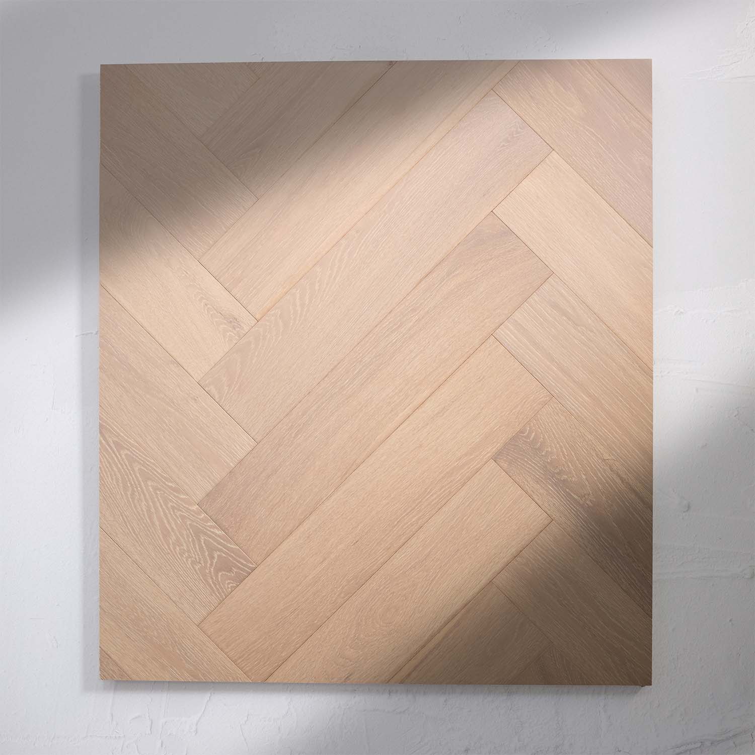Front view of Natural Limed Engineered Timber Herringbone 15.3mm in Natural Limed colour warm tone herringbone flooring sample