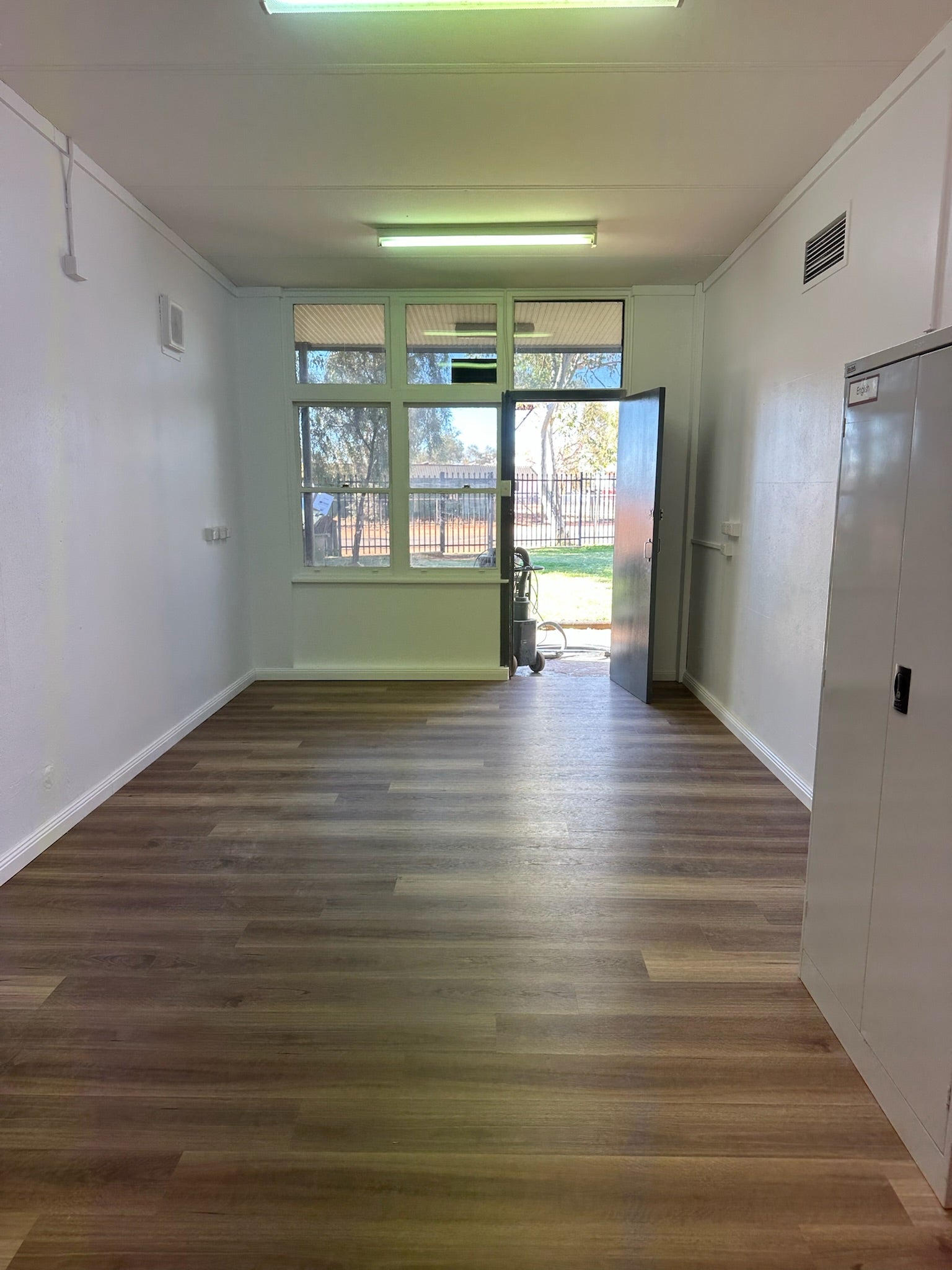 Detail view of QLD Spotted Gum SPC 6.5mm SPC hybrid flooring sample